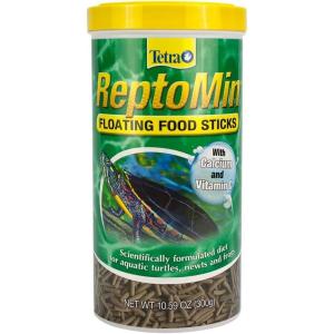 imageTetra ReptoMin Floating Food Sticks Food for Aquatic Turtles Newts and Frogs 1059 oz Pack of 11059 Ounce Pack of 1